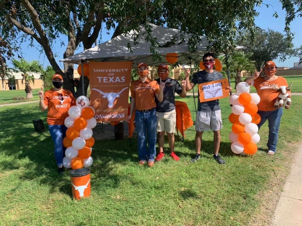 LJHSCoyotes's tweet photo. LJISD Counselors and sons (UT Class of 2023 and Future Class of 2025) ready to distribute masks to LJISD UT Class of 2024 students, compliments of Texas Exes and UT Austin. https://t.co/8D8U1otgvd