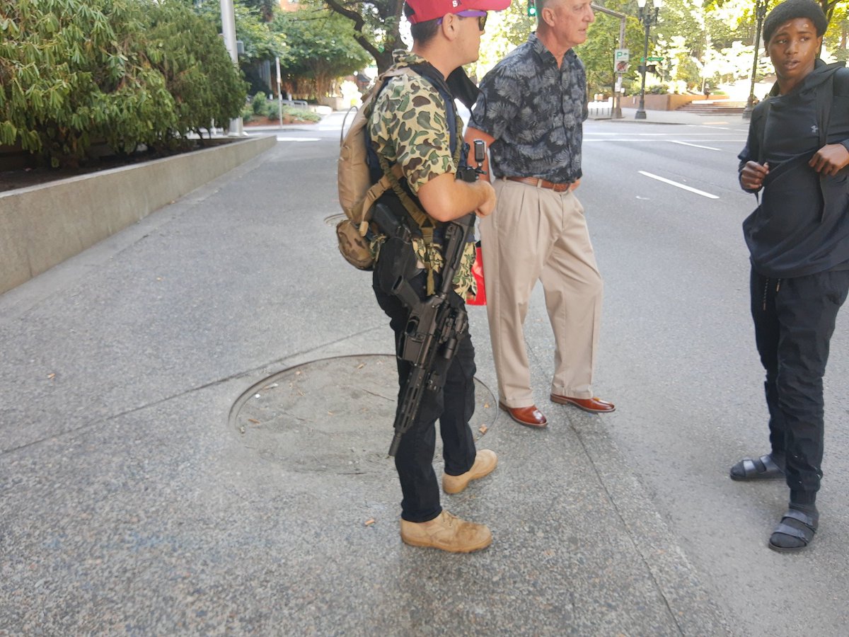 We have a gentleman carrying an unloaded M4