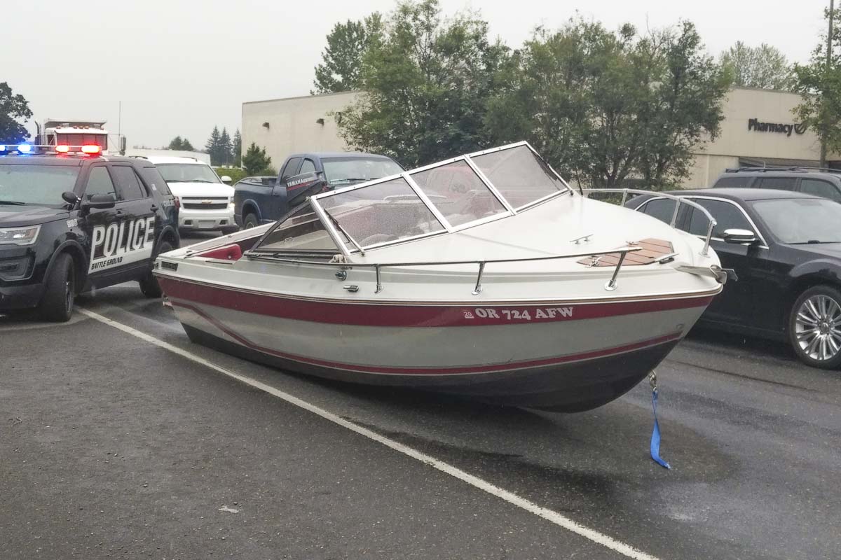 Your car is as useful in the water as this boat is on the road.  Take care, don't drive through flooded roadways.