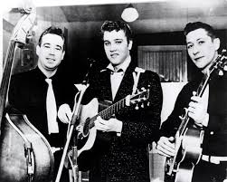 del grupo al que asistía en la iglesia negra de Memphis del reverendo H.W. Brewster, y algo de los clubes de blues de la calle Beale que empezó a frecuentar cuando era adolescente.En julio de 1954, junto Scotty Moore y Bill Black, graban una maqueta con dos canciones