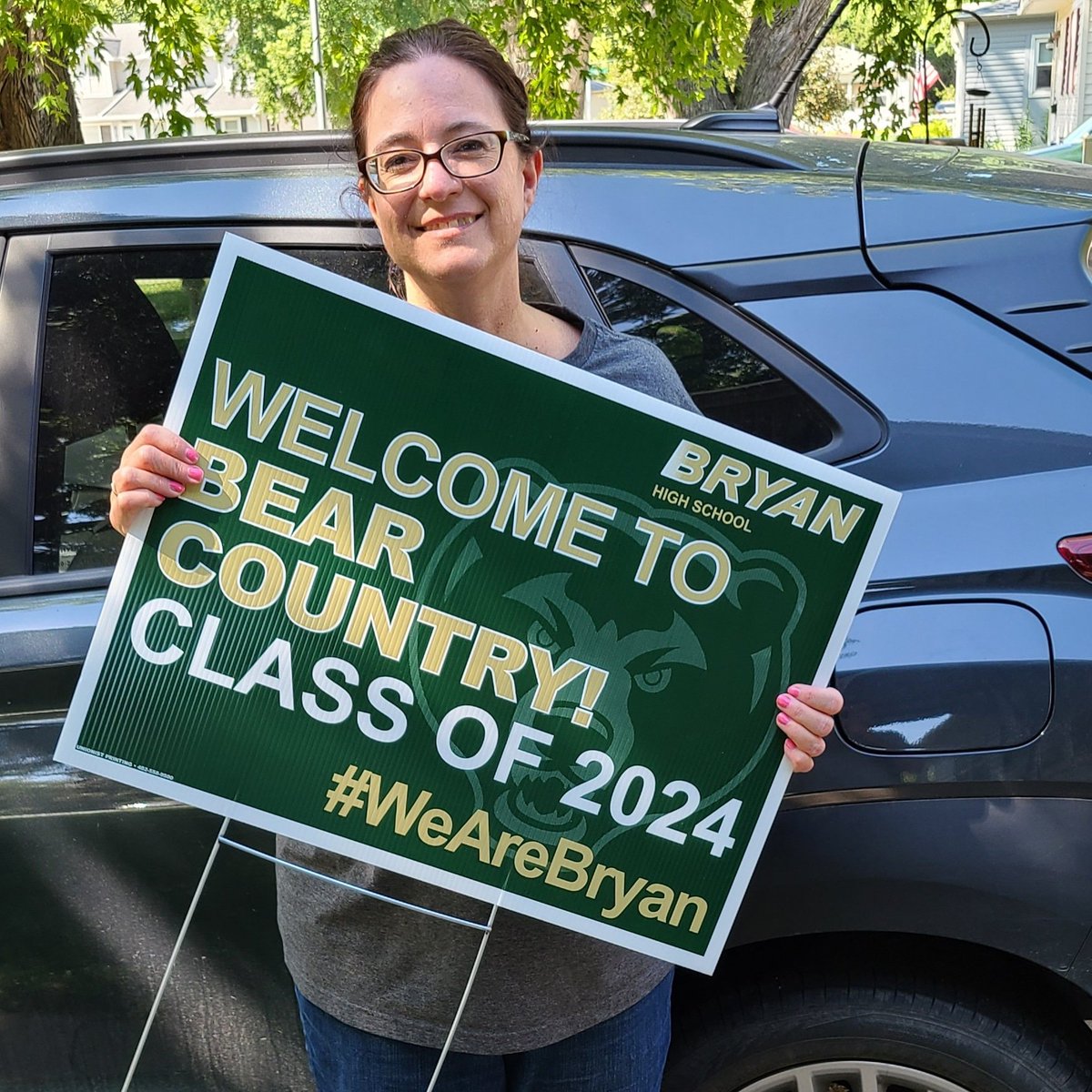 A quick picture before masking up and heading out to deliver yard signs for incoming freshmen. #WeAreBryan