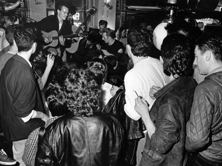 And then, after years of searching, I spotted the back of my napper, fag in hand, bottom left, watching the busking Clash, in Dukes Bar, in Glasgow, in 1985...