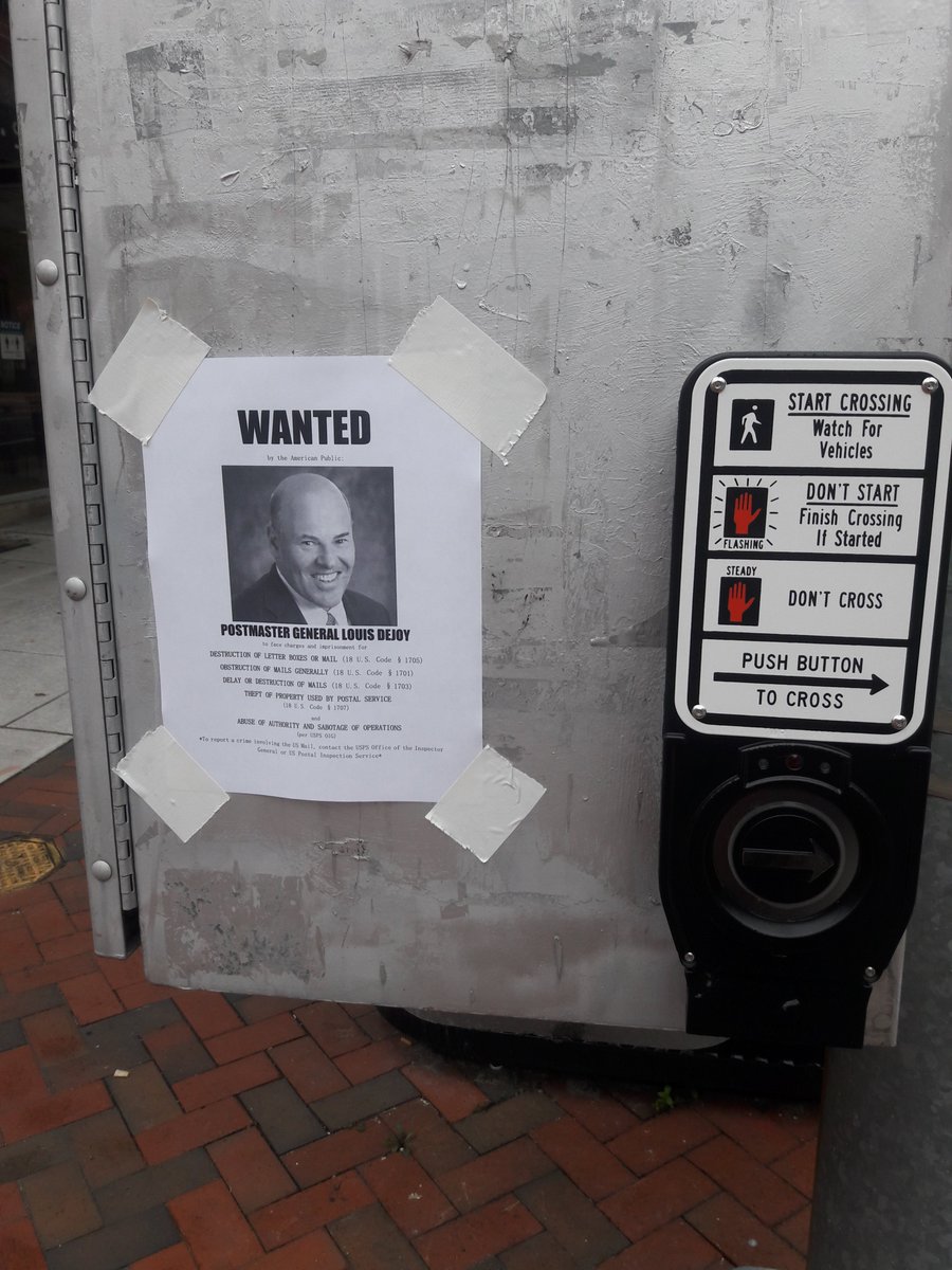BartenderHemry's tweet photo. Spent my afternoon pretty normally: putting up wanted posters for Louis DeJoy. Feels pretty dumb that the Postmaster General is actively breaking federal law to help Trump rig the election, but here we are! #SaveTheUSPS https://t.co/H6jie9bdxW