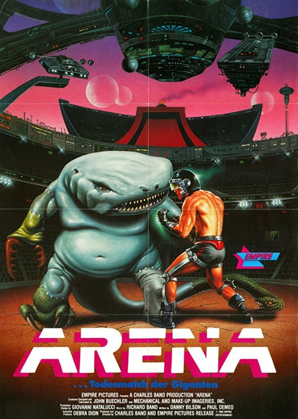 Arena (1989)
Rocky in Space! (Well, Kickboxer, really) The fighter is called Steve Armstrong because he has strong arms and the main villain looks like a vampire who's been spray-painted to disguise himself as a car.