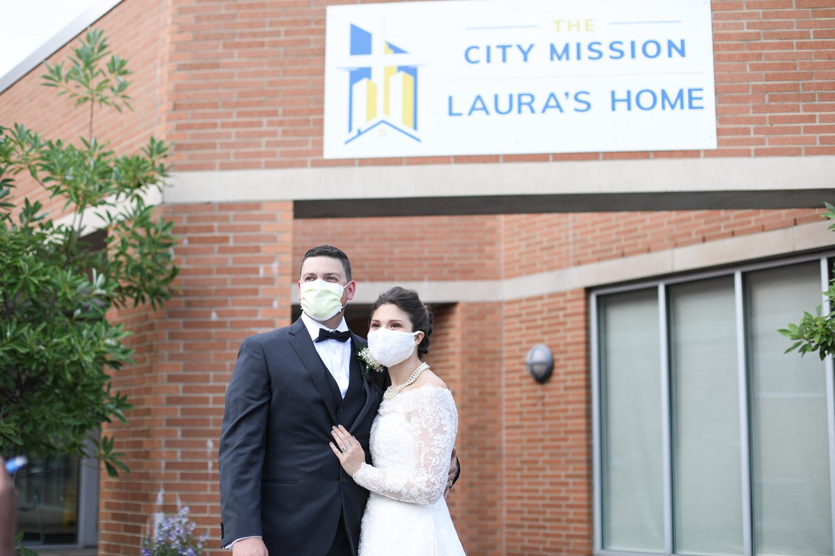 TheCityMission's tweet photo. When Melanie and Tyler's formal wedding reception was canceled due to COVID-19, they decided they not only wanted to donate their reception food to our guests at Laura's Home, but also to serve the meal in their gown and suit! https://t.co/kKFVx0RO6O