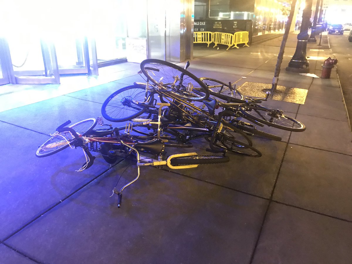 Pile of bikes at Marble/LaSalleAn officer tells some people standing near them to leave, “its over with,” he says.