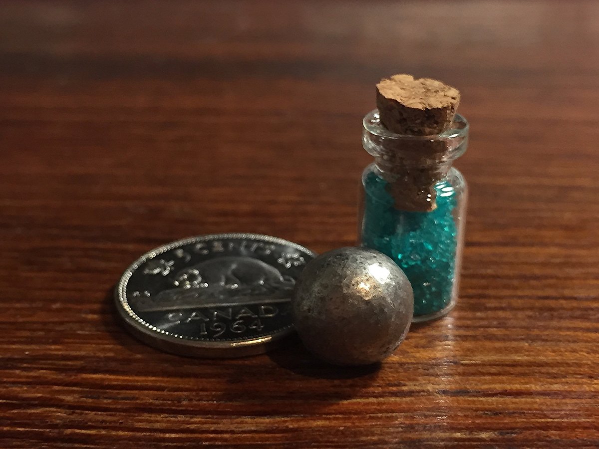 Nickel  #elementphotos. Coin is a relatively rare example of a pure nickel coin. Green compound is nickel sulphate (NiSO4.6H2O).