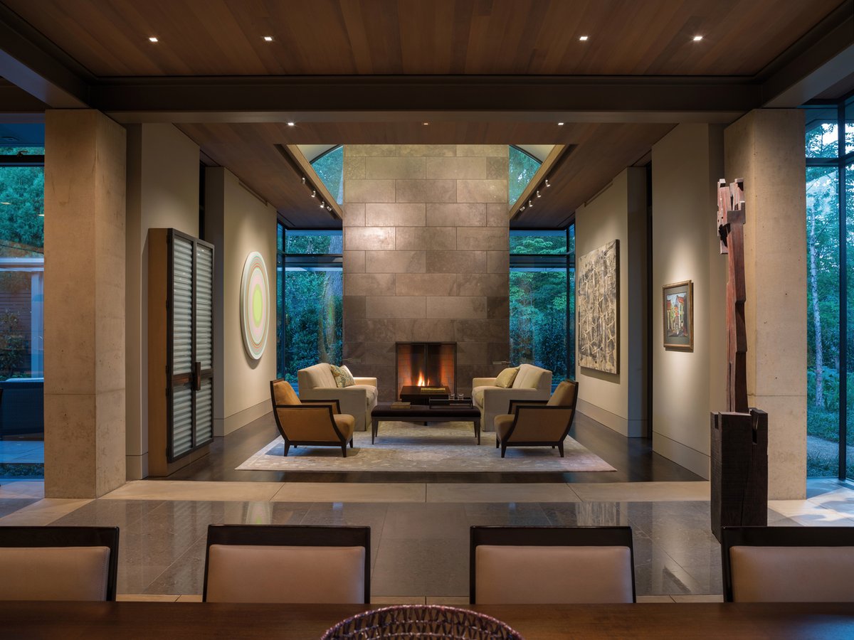 LakzyMary's tweet photo. A traditional 2 level house in WASHINGTON D. C arranged as “alcoves” off a grand hallway with contemporary style and balanced with neutral tones and materials such as stone, concrete and bronze and elegant slabs of limestone on the bottom level https://t.co/ai51Ocwleb