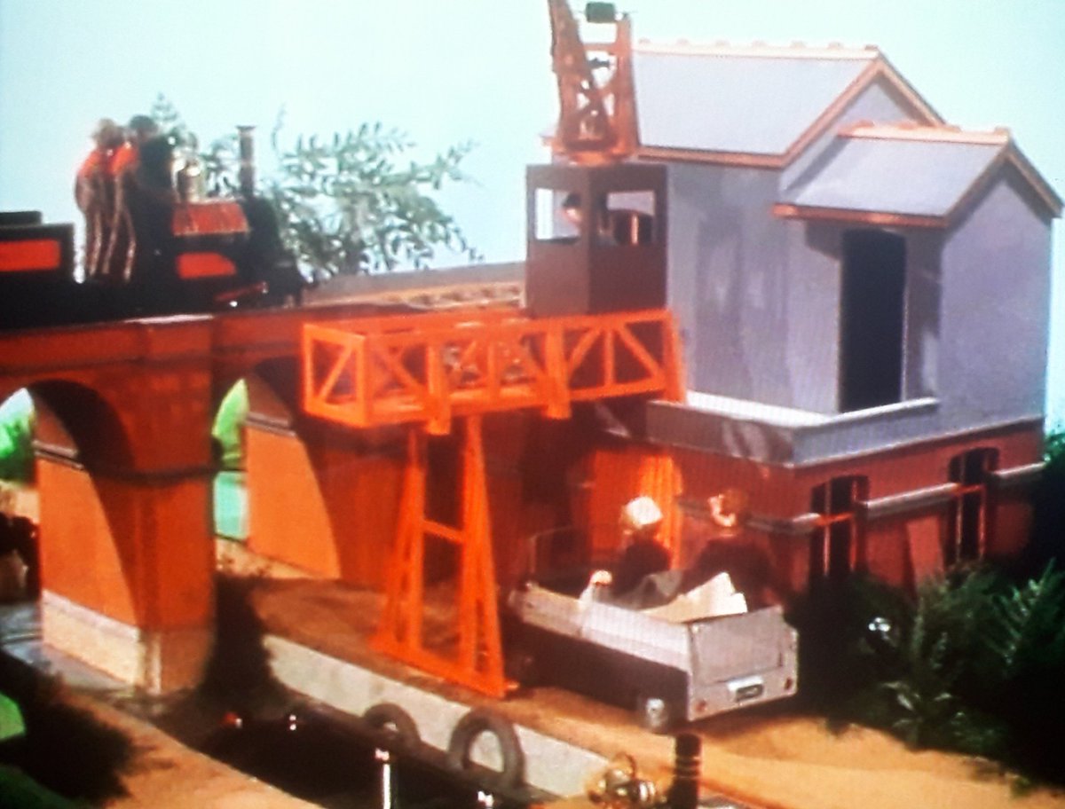 Treddles Wharf, the canal quay with its own private railway access, and used by seemingly everyone in the county on an alarmingly casual basis. A combination of bits of buildings of different vintages with a big modern crane bolted onto the front.