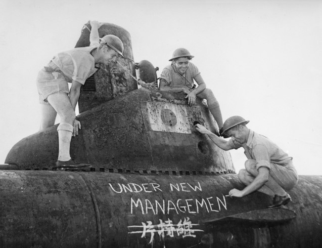 Royal Navy & Royal Australian Navy personnel at the IJN arsenal yard in Tokyo Bay after the surrender...I think their message, scrawled on the hull of a now redundant Japanese midget submarine is about as clear & welcome as one can get. #WeHaveWays #VJDay75