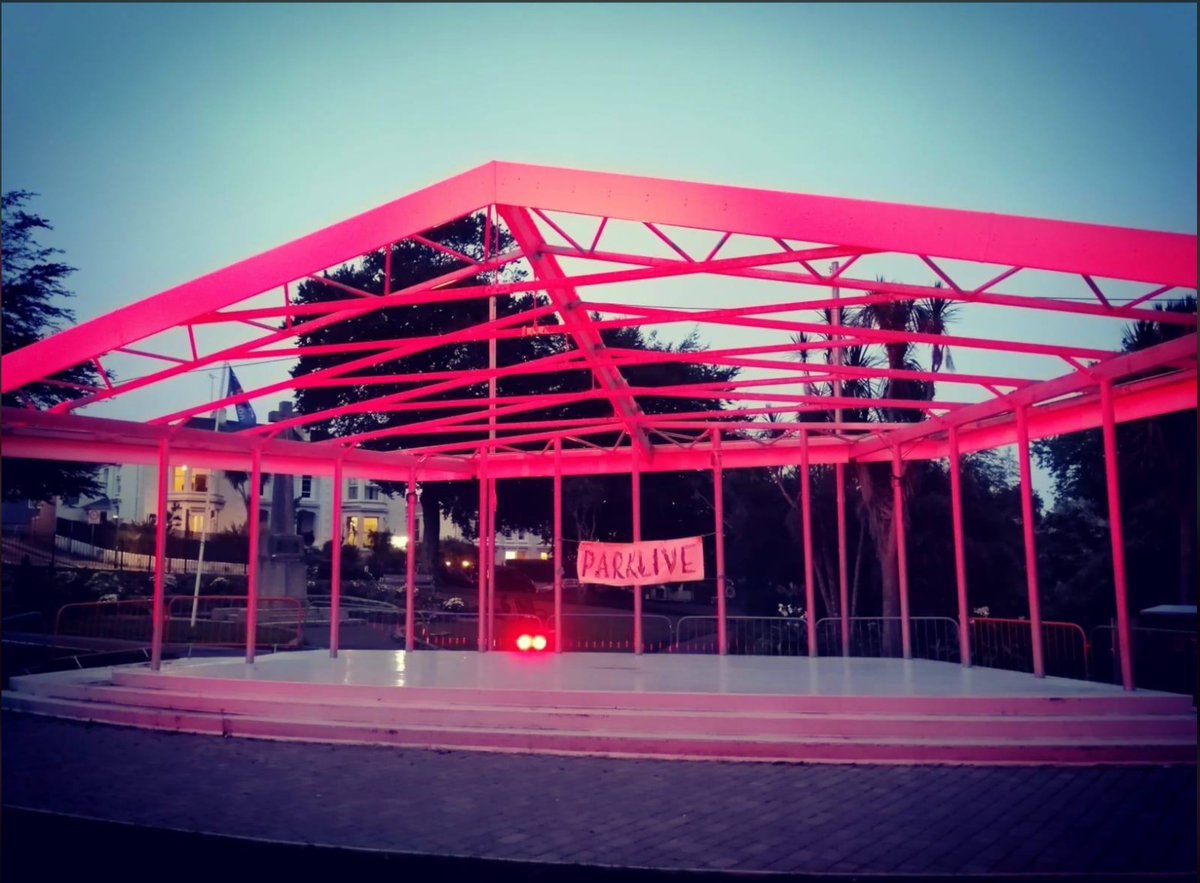 Bandstand in the Kimberley gets illuminated in red by mayor of Falmouth and the team of SourceFM.