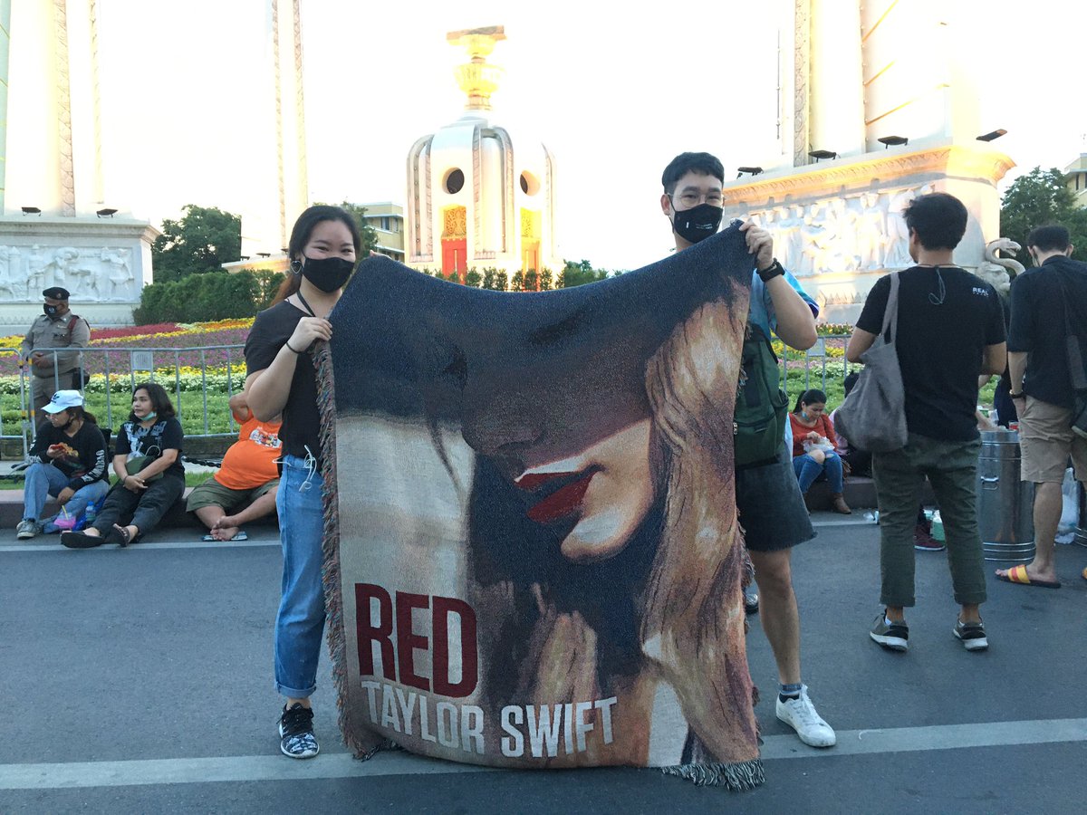 A Thai Swiftie brought a Taylor Swift blankie to the protest! Her RED tour show in Thailand was canceled following the 2014 coup. Thai fans are trending  #OnlyTheYoungCanRun, the song that highlights youth as a beacon of hope amid political injustice.  #TaylorFightwithSwiftiesTH