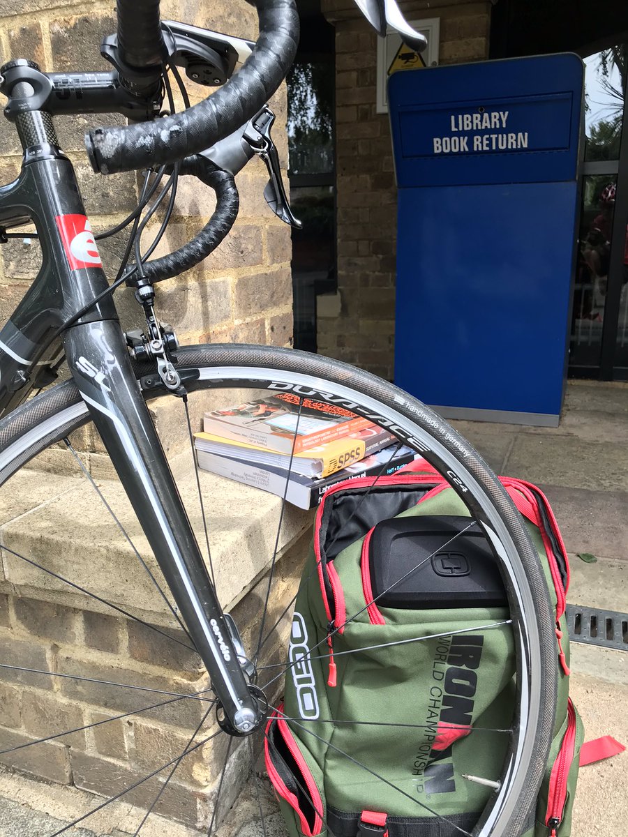 New normal - library book returns 📚 blue bin outside a locked library. Many weekends spent here last two years! 
With my MSc completed April 2020, virtual graduation last week 👩‍🎓 I had a few library books overdue! Deserted campus today #MScgraduate #sportsnutrition #cyclecommute