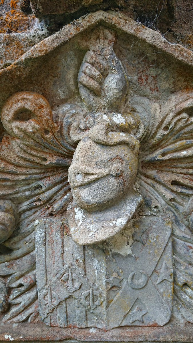 In amongst much incredible detail and memento mori, the impaled arms of James Skirven (d1668) and his spouse Margaret Rigg (d1644) are still clearly visible, with perfect detail, and surmounted by helmet and crest: