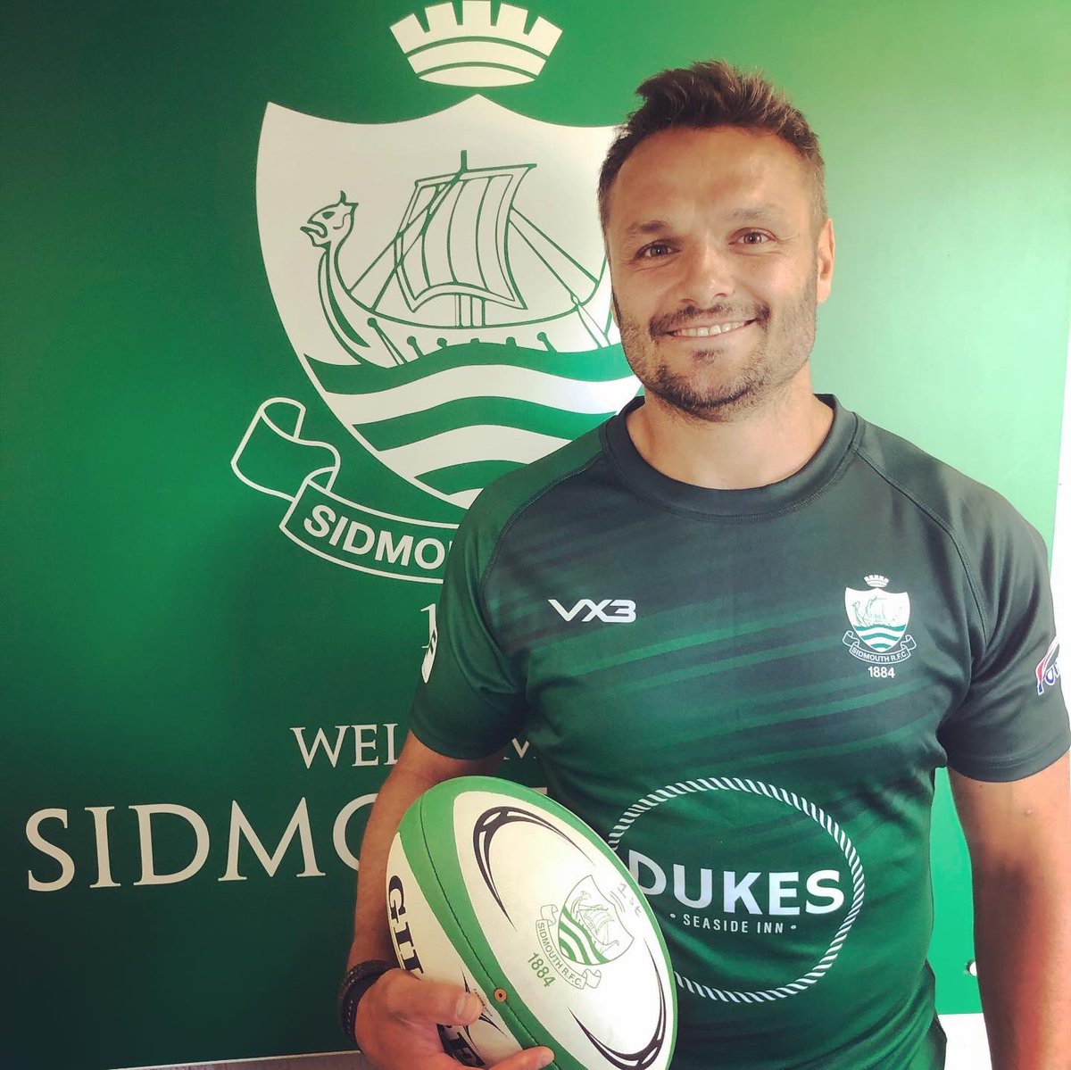 SidmouthRFC's tweet photo. 📢Here it is!! We’re delighted to announce this man will be wearing Green next season!!🔥💪🏉🔥@philldollman @Yenz_2 @Dukessidmouth @VX3apparel @FordsSouthWest #MJS#HLP https://t.co/APo9TsfrUr