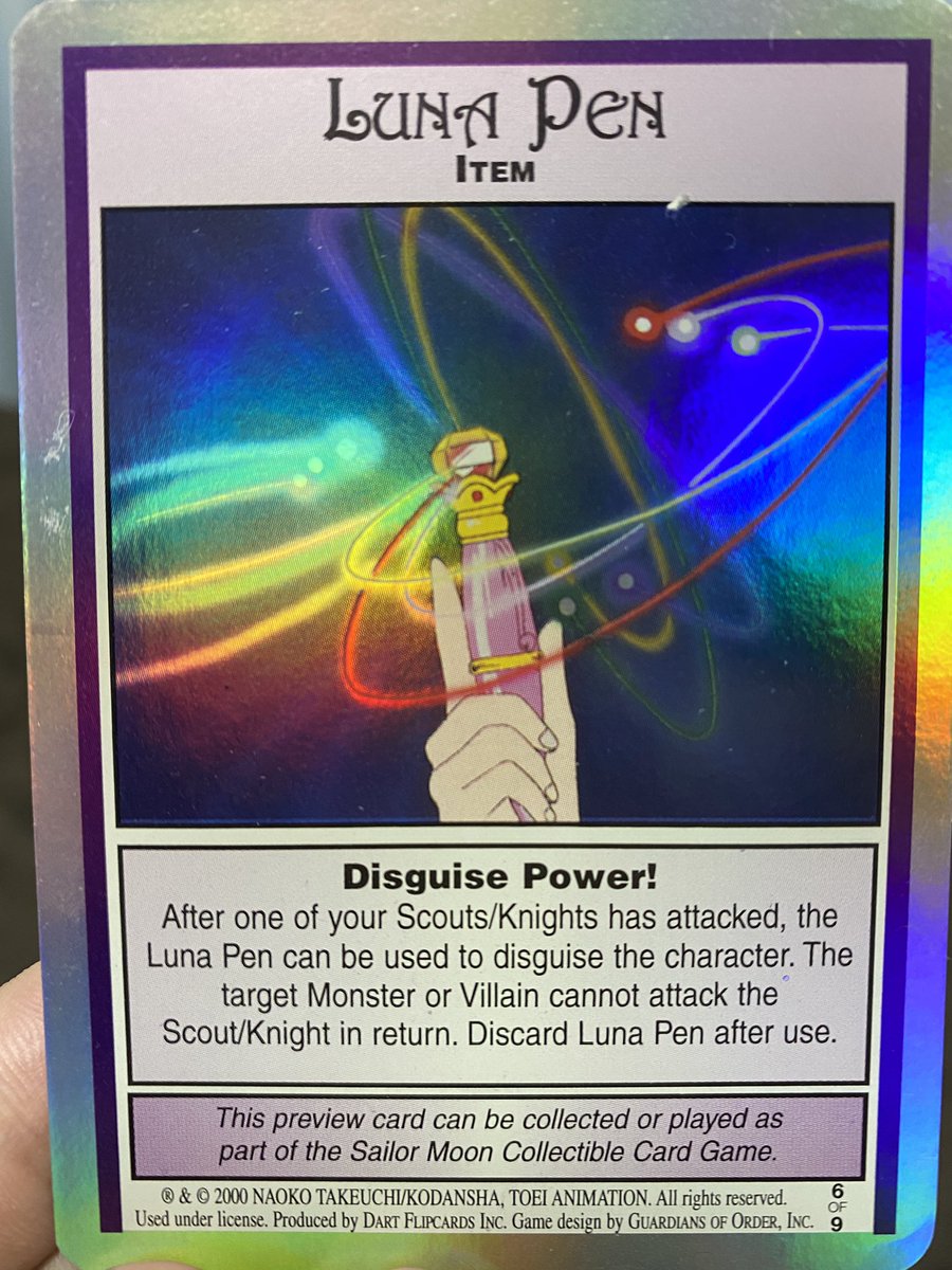Guess who found some holographic Sailor Moon trading card game cards!  I  think the Sailor Venus one is my favorite.