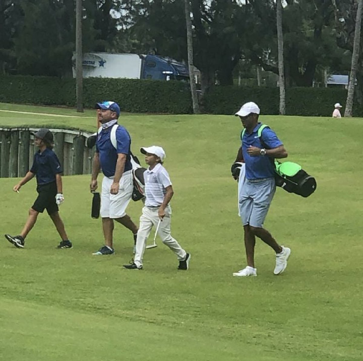 TWlegion's tweet photo. 🚨🔥🐐• #PHOTOS: Tiger caddying yesterday for son Charlie in Florida. (📸: derrick_payne / IG) https://t.co/jleOdiJvmG