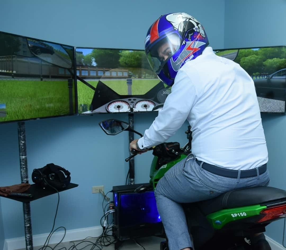 TheOasisPR's tweet photo. It's official! @matthewsamuda cuts the ribbon to signal the opening of the first Motorcycle Training Centre in Jamaica! The location will feature a state-of-the-art motorcycle simulator. #nrsc #below300 #itcouldbeyou #roadsafetycouncil #Motorcycle @below300ja https://t.co/6BVHz2F6do