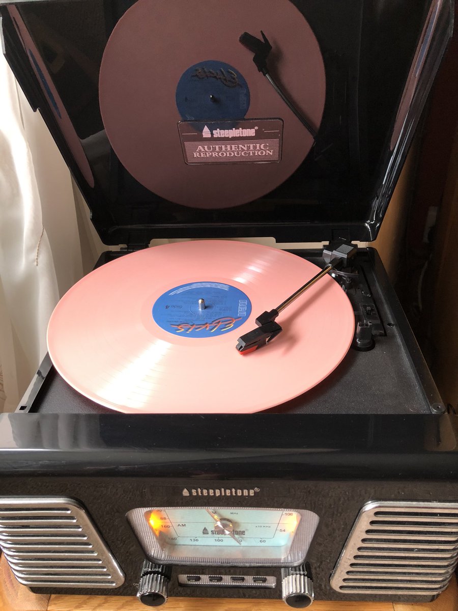 BigNige1962's tweet photo. @ElvisFansWorld Listening to this beauty. Pink vinyl. More than 40 years old. And reading Last Train To Memphis. https://t.co/PCm3YCgUlP
