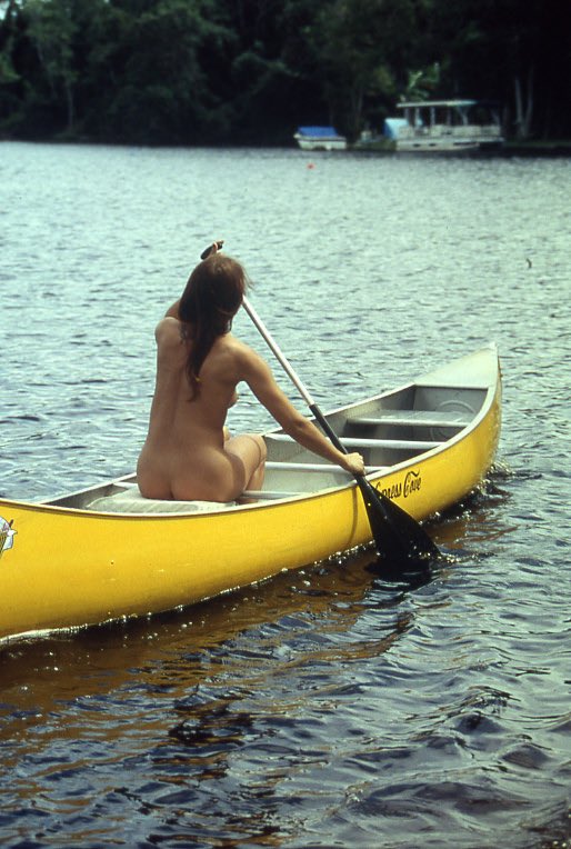 Topless Canoeing.