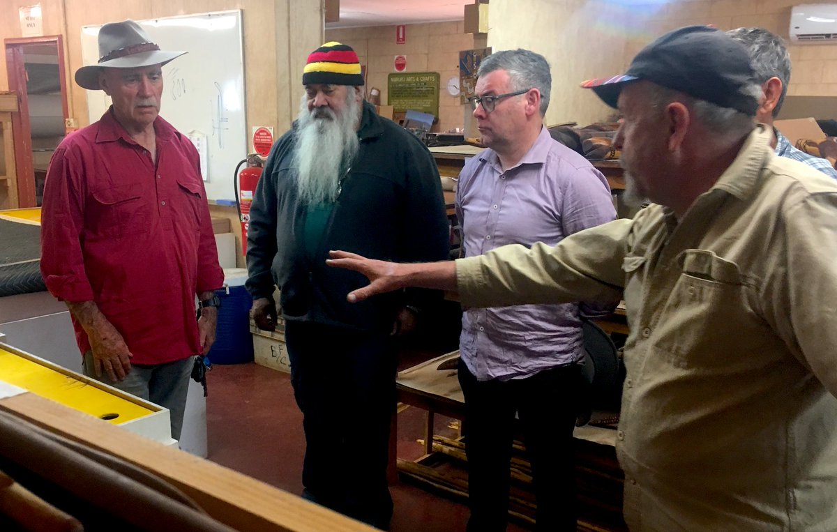 UluruTV's tweet photo. Uluru, 17 Aug 2019, seems a long time ago: @MarukuArts shows local art/@ulurustatement to @manwiththemo @SenatorDodson @MurrayWatt @Malarndirri19  @LindaBurneyMP &amp; @SharonClaydon. No COVID-19 here yet, but huge, ongoing impact on communities @KenWyattMP @ScottMorrisonMP  @AlboMP. https://t.co/LyEIfNzIyk