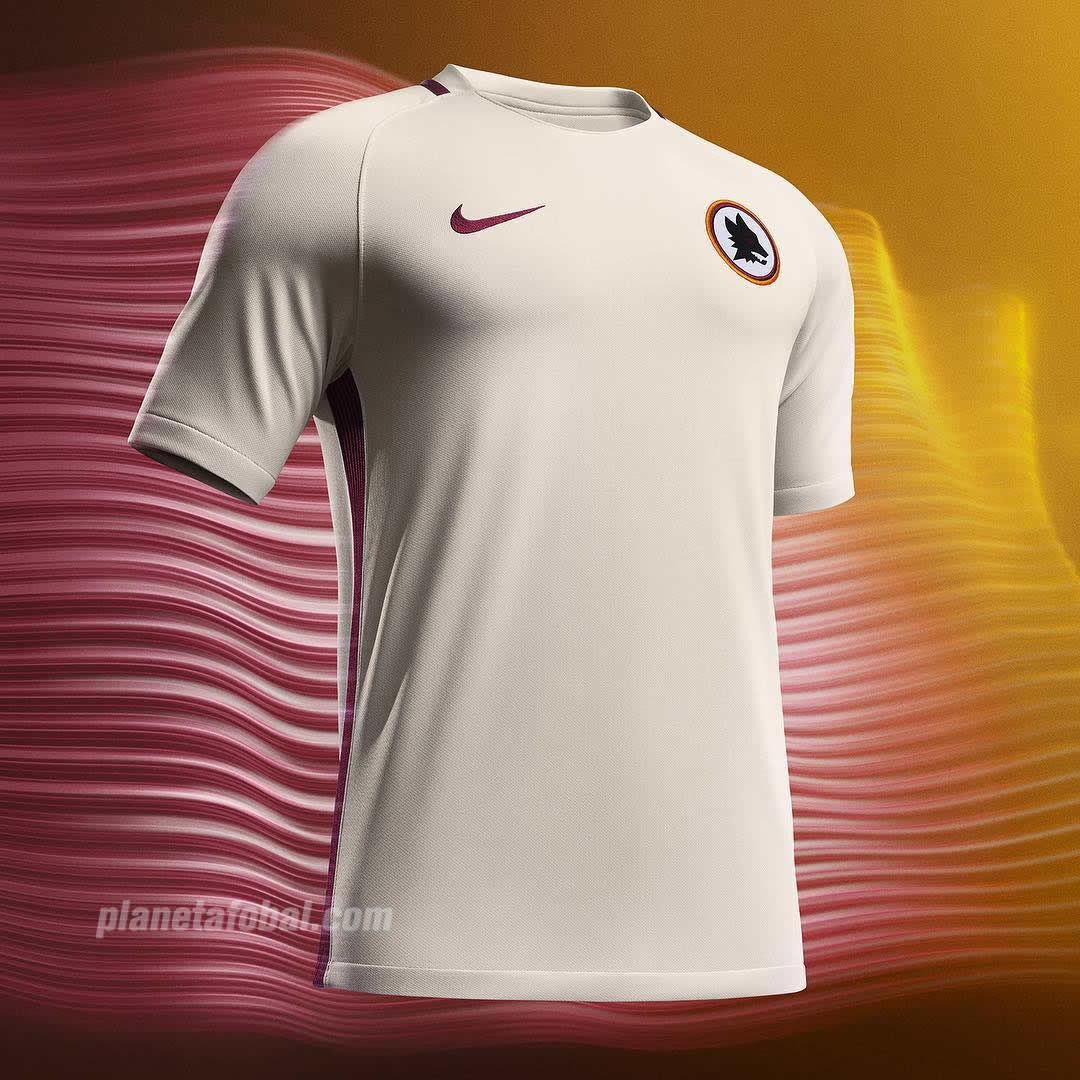 Volvia el clasico escudo con la cabeza de lobo en la camiseta alternativa.La camiseta no destacaba por diseño, basicamente era blanca con detalles rojo oscuro.