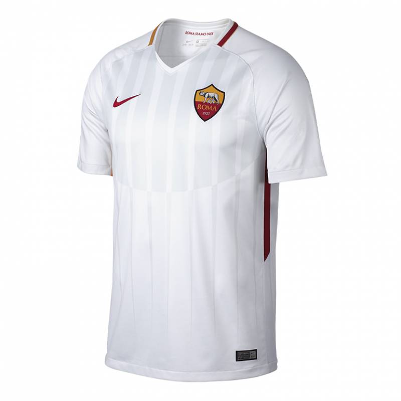 La camiseta alternativa era blanca con un diseño a bastones grisaceos al frente.Los colores rojo y amarillo aparecen decorando cuello, mangas y en los laterales de la camiseta.
