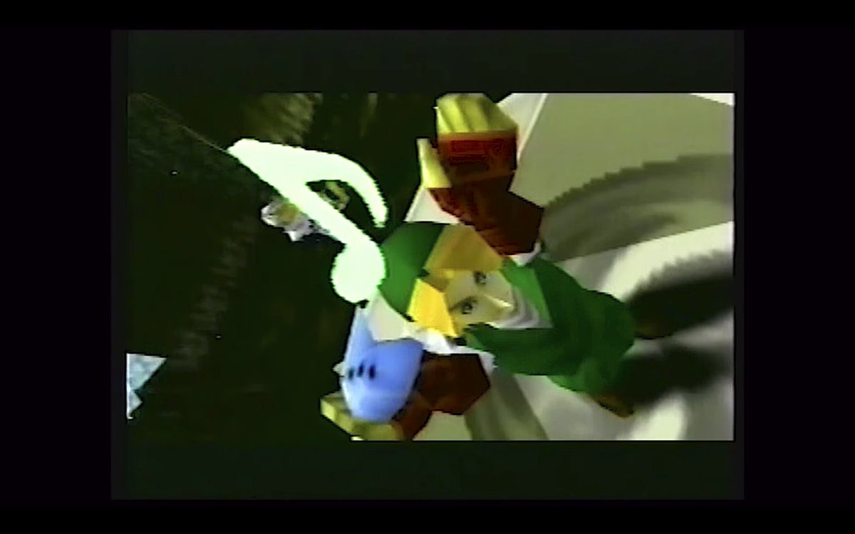 One of JacePlace's finds. The old song-learning cutscenes have Link do this pose. (There should be a musical note item above his head, but the object isn't loaded in the final scene.)