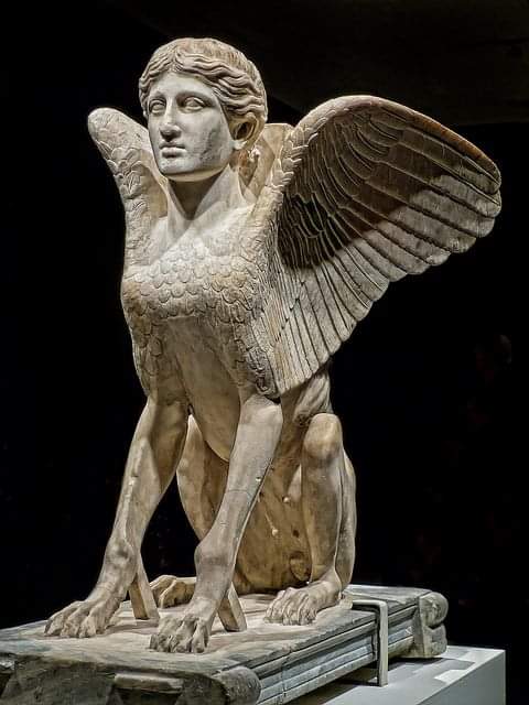 HistoryLowlife's tweet photo. A pretty badass statue found in the Roman city of Lanuvium, not far from Rome. It dates to around AD120-140. Archeologists reckon it might have been a very elaborate table holder-upper, presumably one at each corner, the table resting across the wings?

Love the big doggy paws! https://t.co/B8fzOT28fz