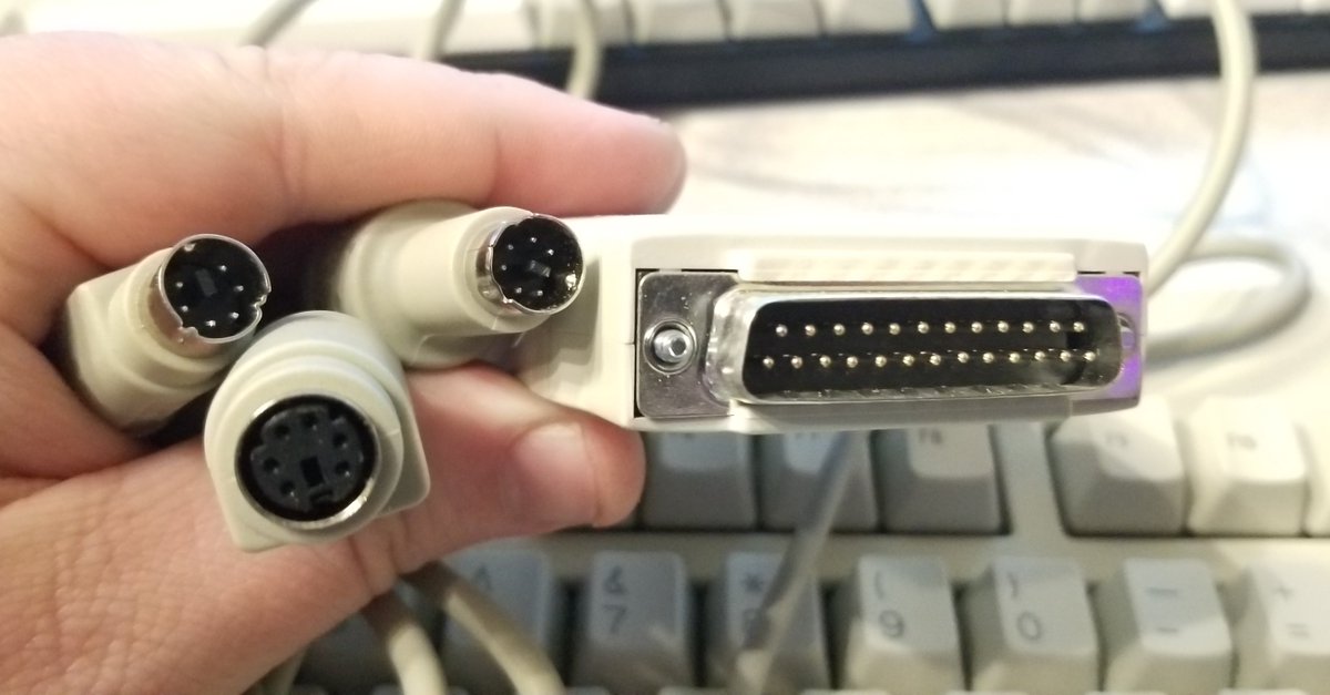 I got a keyboard recently, and it connects in the standard way, using two male PS/2 connectors, one female PS/2 connectors, and a parallel connector. You know, the usual.