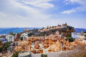 The Palitana temples were built over a period of 900 years starting in the 11th century. It is in the Bhavnagar district of Gujarat. It is a full city with more than 900 temples of different sizes dedicated to the 24 Tirthankaras from base to the peak of the Shatrunjaya hill.