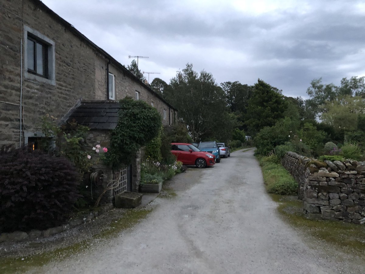 THREAD. What happened when ‘No Cycling’ signs went up unannounced in our village? In May, in the height of lockdown, a pair of signs went up in our village - along the road we live on. It’s a small hamlet with an unmade road. It looks like this. There’s 13 houses. 1/.