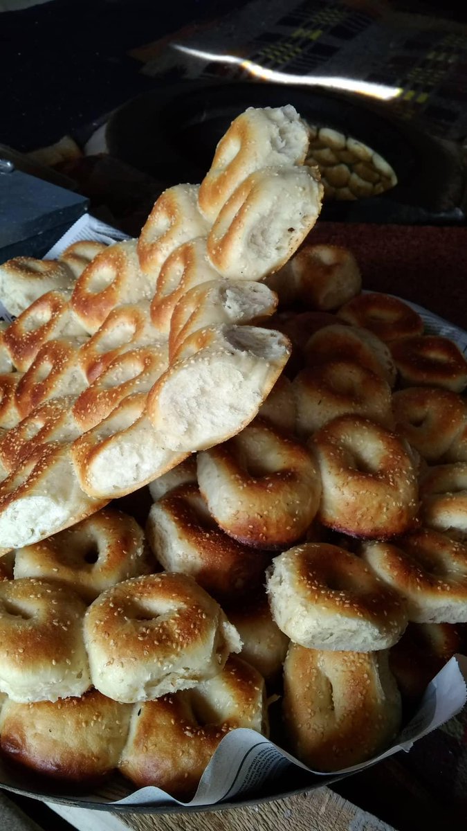 This bagel shaped bread is a afternoon tea bread called Tsochwor or Tilvor. Top is soft and it gets crispy at the bottom. Best enjoyed with nunchai aka butter tea.
