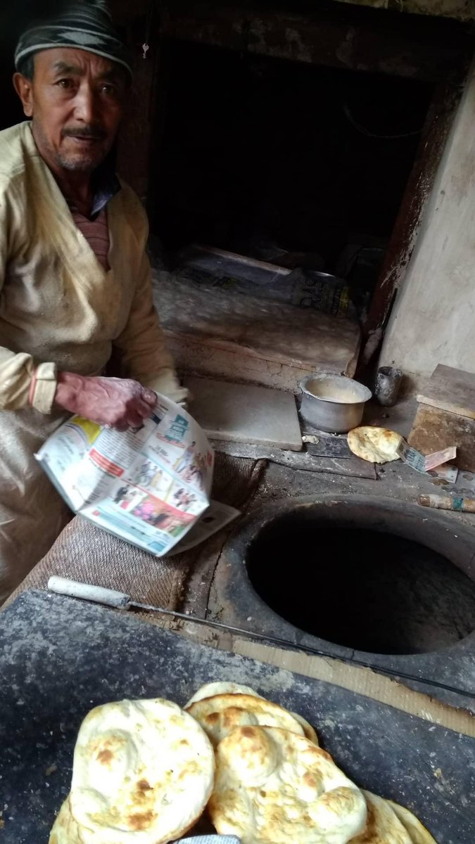 What looks like naan is actually a bread called Lavasa. Crispy on the outside and soft inside. Best enjoyed with butter.