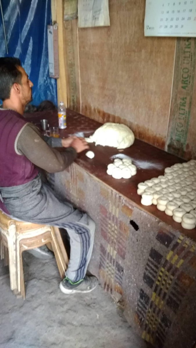 This bagel shaped bread is a afternoon tea bread called Tsochwor or Tilvor. Top is soft and it gets crispy at the bottom. Best enjoyed with nunchai aka butter tea.