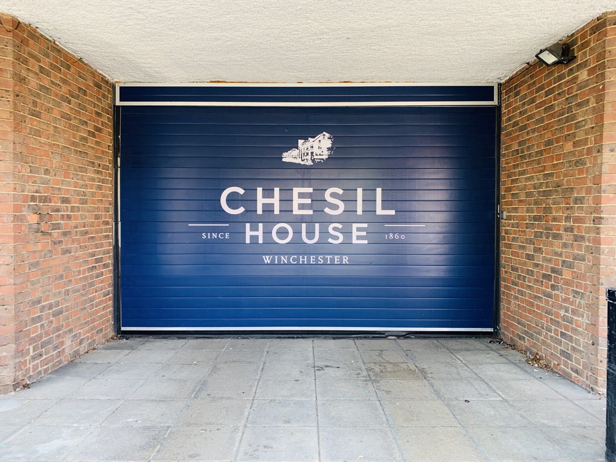 MintSigns's tweet photo. A recent fitting for Chesil House in Winchester - White fret cut text on vinyl onto a garage door - looks great on the blue background!

#mintsigns #mintwraps #print #graphic #wraps #signs #chesilhouse #winchester https://t.co/YnnXAtt8EN