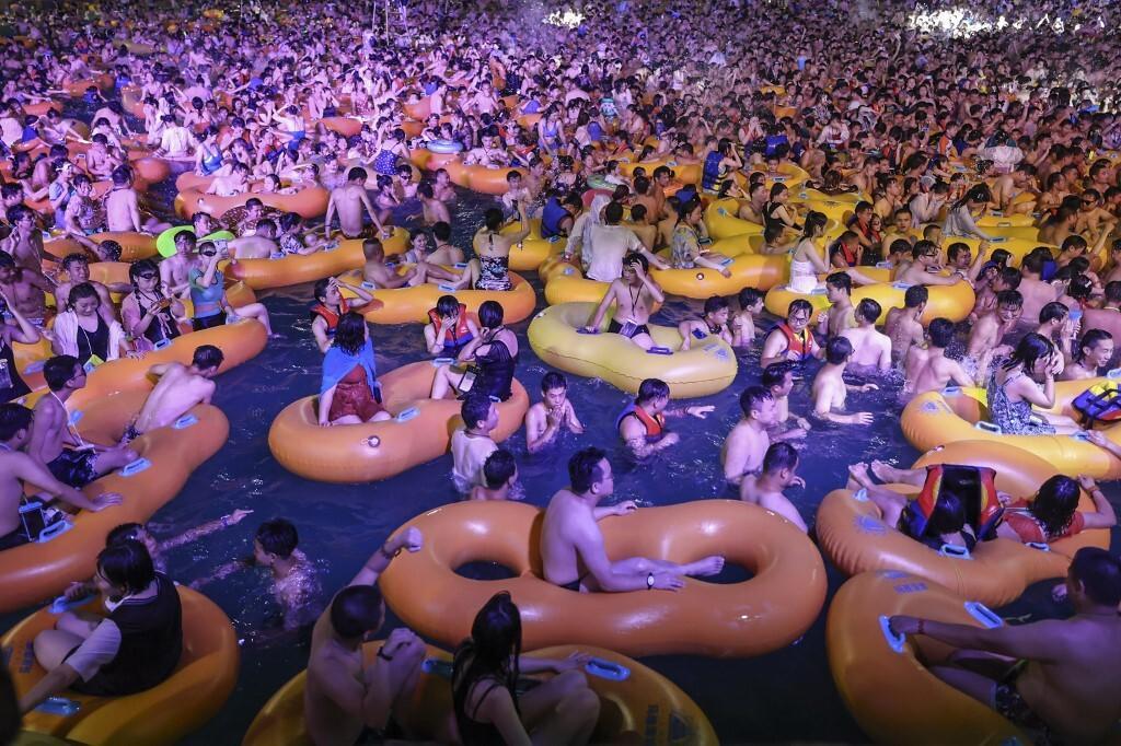 rapplerdotcom's tweet photo. Cooling off.

LOOK: Hundreds attend a pool party in Wuhan, Hubei province, China on Saturday, August 15.

Wuhan is the epicenter of the COVID-19 outbreak in China. It lifted its lockdown in April. Photo from AFP https://t.co/40eSijZ0E7