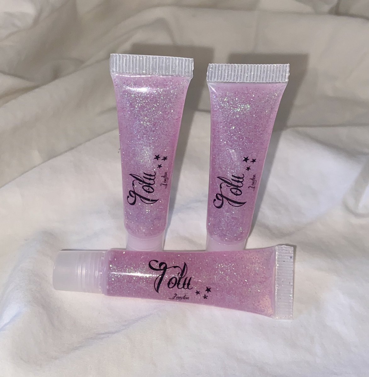 LondonTolu's tweet photo. Our collection goes live today at 1pm so be sure not to miss out https://t.co/WG4QyA9FHX #SmallBusiness #lipgloss #BlackOwnedBusiness https://t.co/bSLDZYaeMW