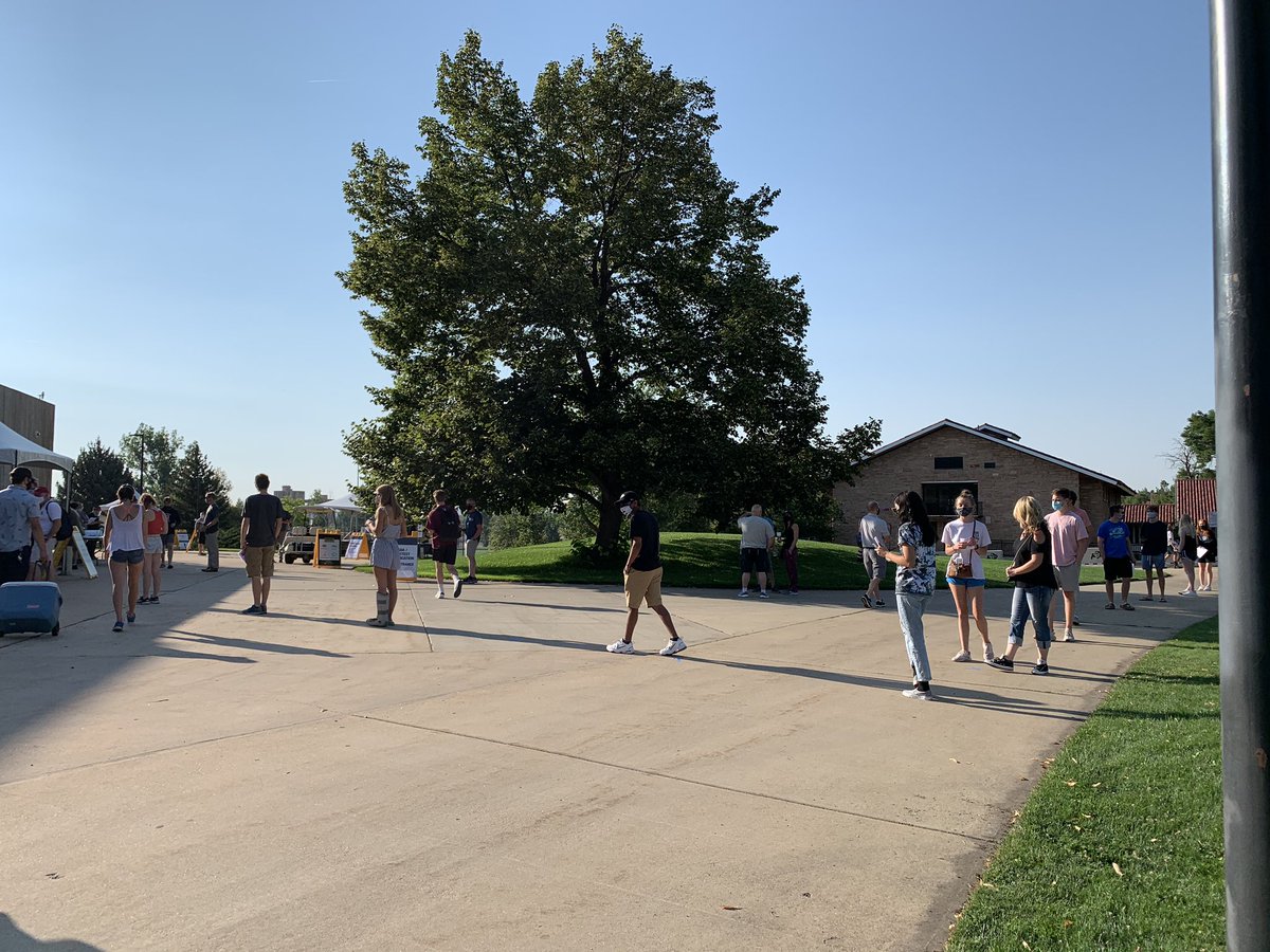This is where students are lining up to get tested. They get a bracelet showing they’ve been tested and then head to their dorms to move in, if all is well.