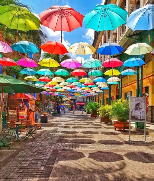 AfricaFactsZone's tweet photo. Umbrellas Street in Port Louis, Mauritius. https://t.co/P5umOgLXOl