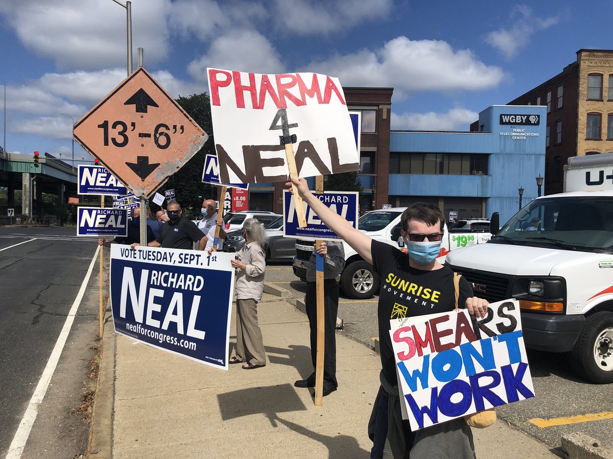 Supporters of congressman Richard Neal and his opponent Alex Morse gather before debate in Springfield.