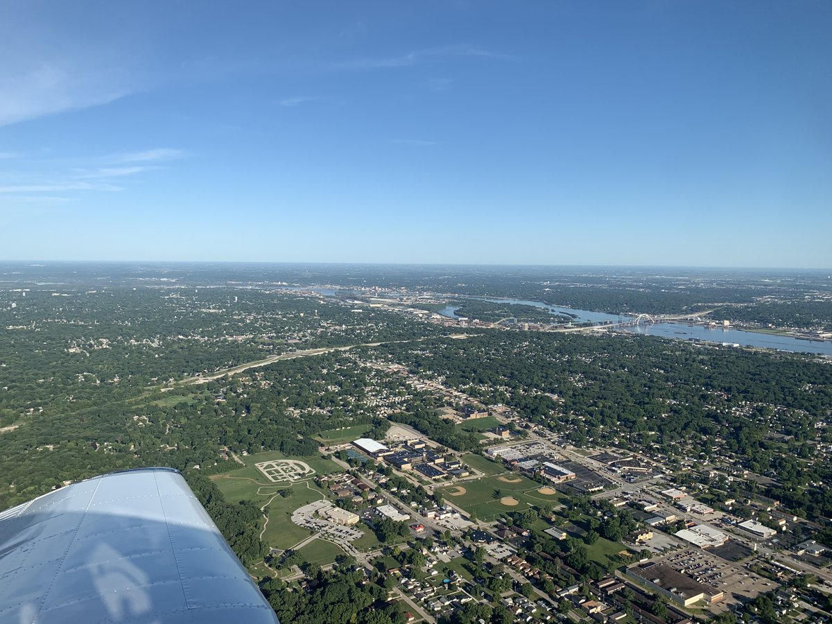 In any case, with the previous storms having been driven by a cold front, the weather that AM was crisp and gorgeous - perfect flying weather. You can see here downtown Moline with Iowa across the river, and the Rock Island Arsenal on an island in the middle of the river.