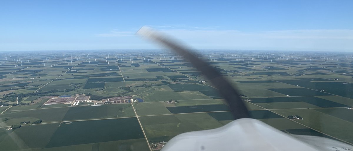 I've heard that some parts of the midwest have gone in big on wind power and saw plentiful evidence of this, with many wind turbines dotting the landscape of central Iowa. None appeared to have been damaged, though none were turning either - probably due to light winds that day.