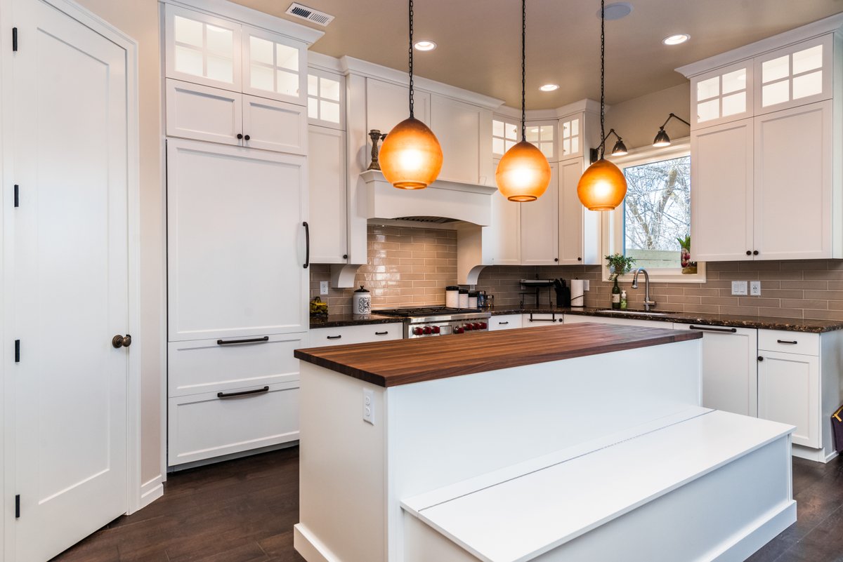 LivingZenith's tweet photo. Living Zenith Kitchen accents focus on beauty and usability. The dual function of bar stool and extra space. The spacious cabinetry with lighting windows for display up top. #utahhomes #energyefficienthomes #kitchendesign #kitchendesignideas #sustainableliving #netzerohome https://t.co/D2kz5CetTp