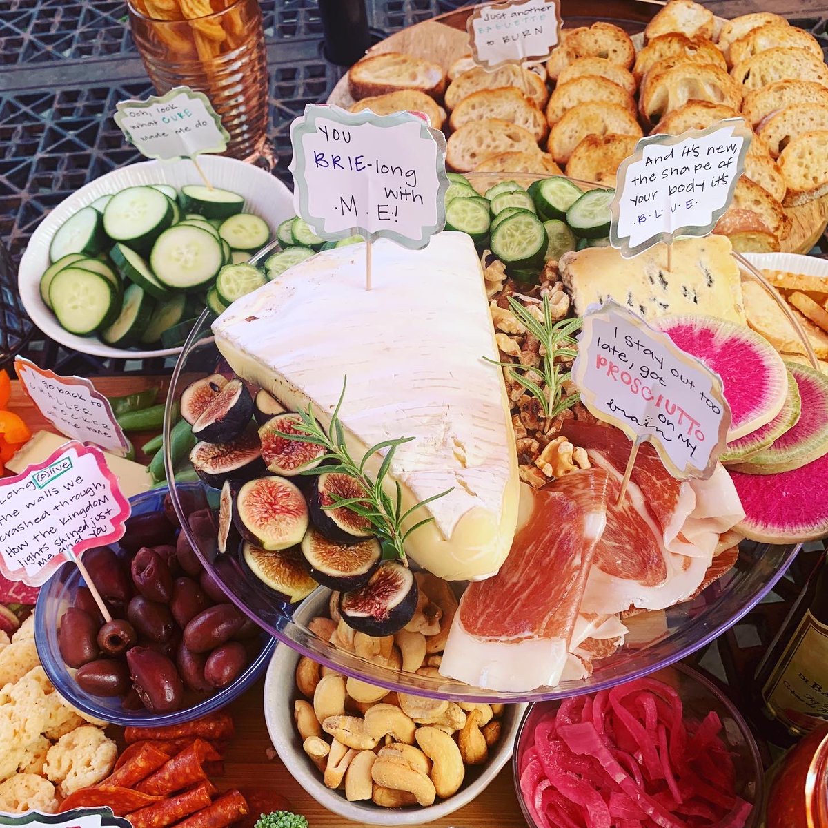 MaryCaroline12's tweet photo. Haven’t been on Twitter in forever but hopped on to share the @taylorswift13 inspired charcuterie board we made for @cravings  - we spent hours brainstorming tswift lyrics to use for the labels and made sure to have one from each album. It was the most fun I’ve had all year ❤️ https://t.co/V7mJ2t9EJ8