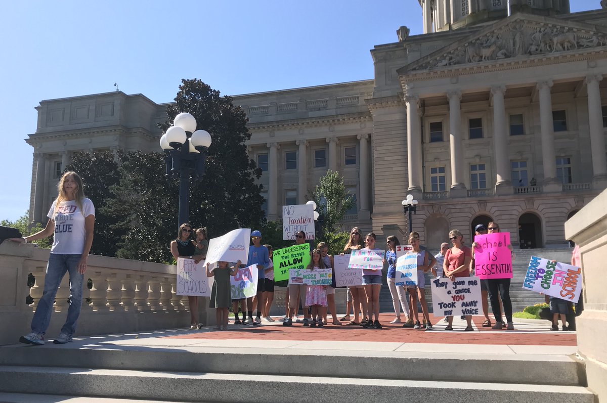 Just spent an hour talking to 25 or so parents & kids protesting delays to in-person school. They want classrooms opened now, 5 days a week. One of the signs, "We understand the risks, allow in-person school" pretty much sums up their wants. Here's some of what I learned: