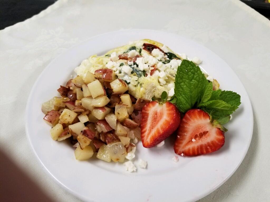OwenValleyHC's tweet photo. Today started THEME WEEK! We are so excited to share a week of Alice in Wonderland with our residents.
This morning we started with a Red Queen Omelete paired with red potato hash for breakfast. https://t.co/KXQsg6LzOu