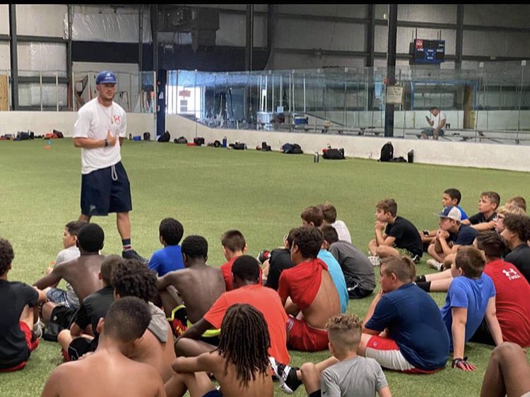 OrlPirates's tweet photo. Our main man and QB @SBreezy_10 took time with #SAYA Student Athlete Youth Association to work with the young athletes and pass on some of his swag! 🏴☠️ 📚 🏈
#PiratesGiveBack https://t.co/ffNPjMGeth