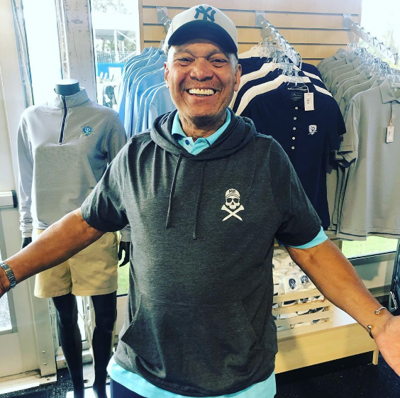 TheVacationDR's tweet photo. Golf is back in full swing, but chances are you need some new gear. Join my friend @mroctober and check out our newly restocked @thevacationdr apparel line, where 100% of net proceeds go to charitable causes: https://t.co/MlTEvsJXyz. See you on the course! https://t.co/vEq1FY8dw2