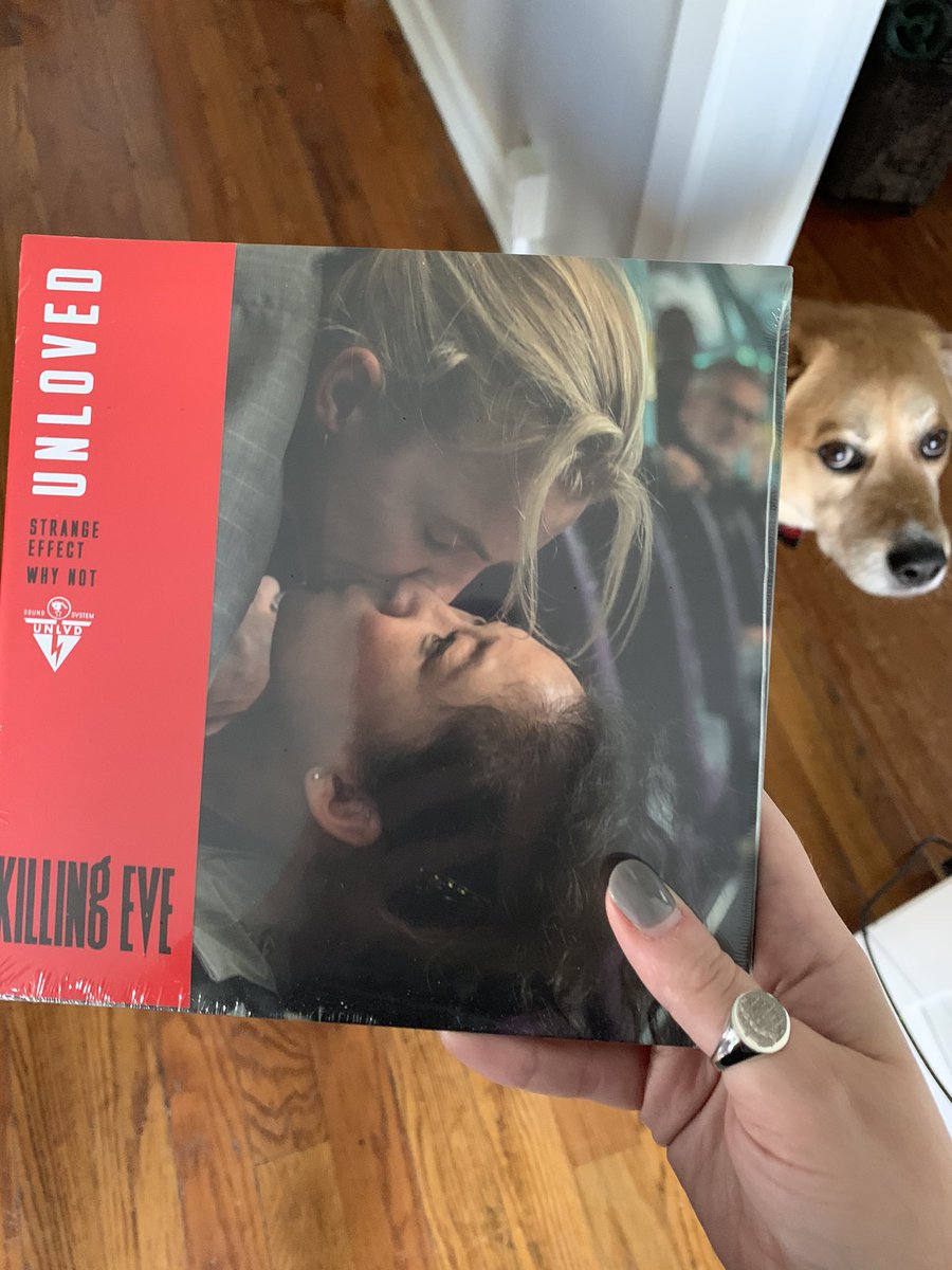 SlipOfTheHand's tweet photo. It was a @KillingEve filled mail day and it’s made my Monday so awesome! (Don’t mind my doggo being a creeper in the background 🤣😂) #KillingEve @weareunloved #StrangeEffect #vinyl #VillanellesRing https://t.co/yumx519uOT